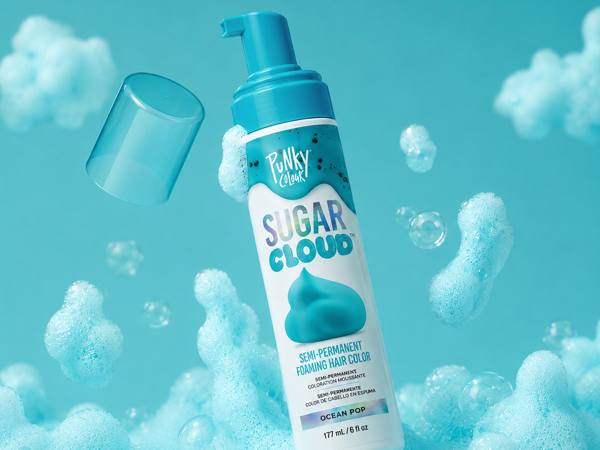 Punky Colour Sugar Cloud Ocean Pop semi-permanent foaming hair color bottle surrounded by blue bubbles on a turquoise background.